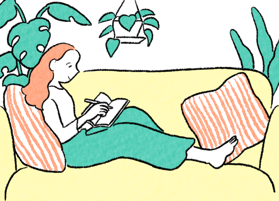 女性が日記を書いている様子