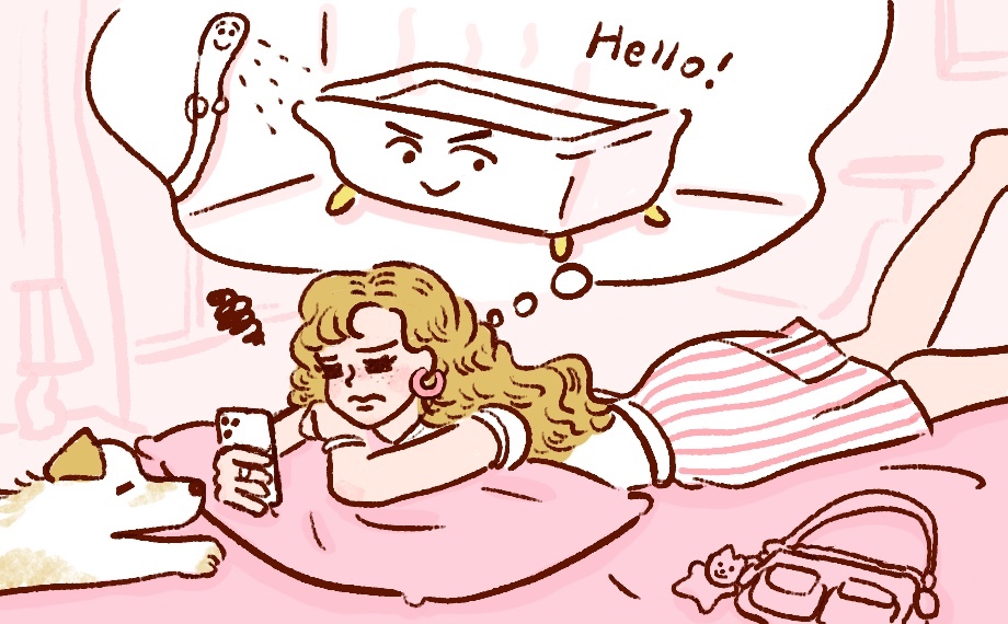 お風呂に入るのをめんどくさがりスマホを見続けている女性